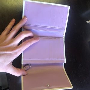 Lavender Coach tri-fold wallet